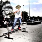 Jeansre Bester styling on the rail at the local Skate Park