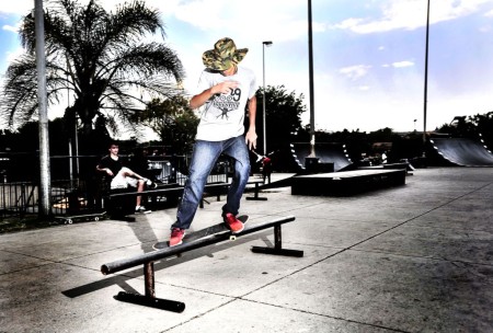 Jeansre Bester styling on the rail at the local Skate Park