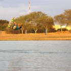 Candice Bacon hitting the kicker in the ladies Wakeboarding division