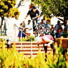 BMX trains over the rail at the Seapoint Library