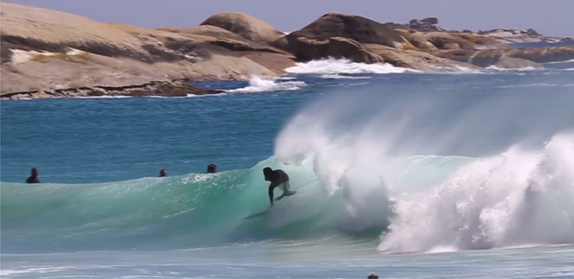 Michael February shows his surfing style in Cape Town's waves