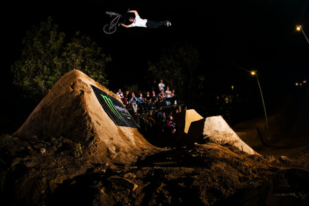Kevin Peraza throwing a huge superman seatgrab in The Night Harvest BMX contest
