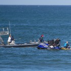 Surfers being rescued by the water safety team