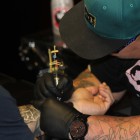 Grant Chapman tattooing out of SkullBox and Tattoo Company