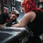 Daniel Forster tattooing a client at Heart & Hand Tattoo