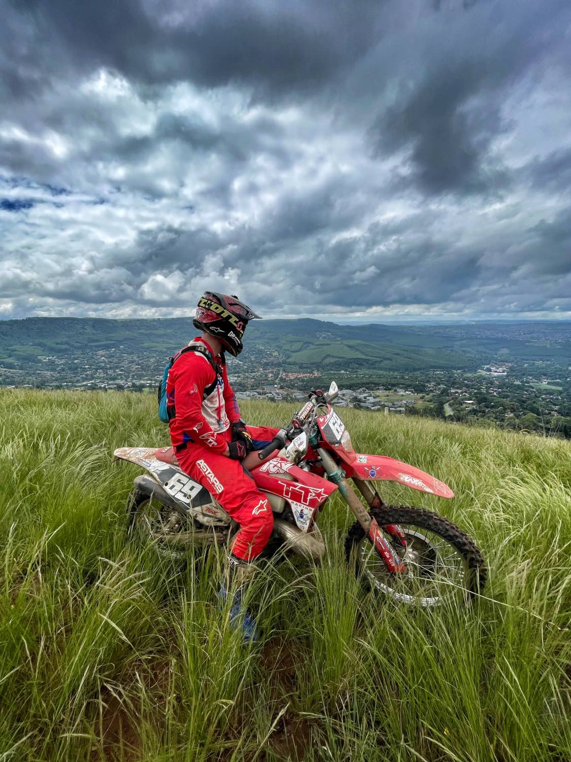 Travis Teasdale overlook the town of Pietermaritzburg where he rains for Hard Enduro races