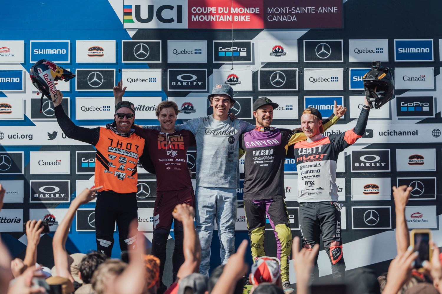 Elite Men's podium from Round 7 of the 2022 UCI Downhill MTB World Cup in Mont-Sainte-Anne, Canada